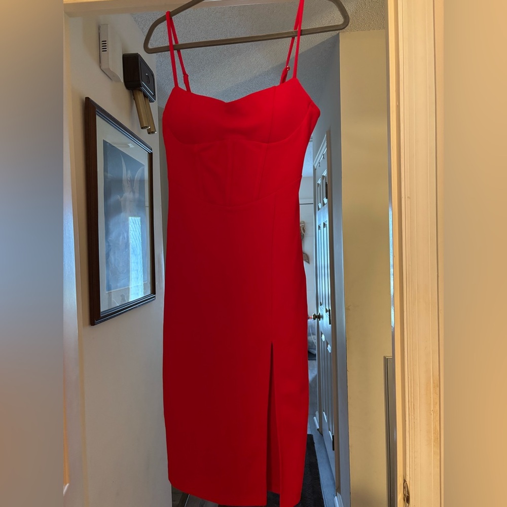 Red body con dress with leg slit